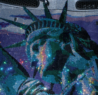 Illustration for article titled Mini Cooper Covered In One Million Swarovski Crystals... Is Proud To Be An American?